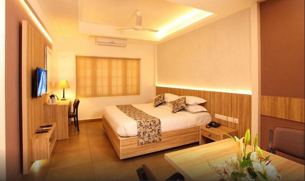 Hotel Luciya Palace Thrissur Ruang foto